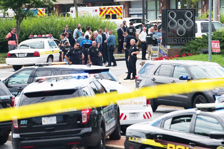 Policiais isolam área após tiroteio no jornal Capital Gazette, em Annapolis, no estado americano de Maryland - 28/06/2018 Policiais isolam área após tiroteio no jornal Capital Gazette, em Annapolis, no estado americano de Maryland - 28/06/2018