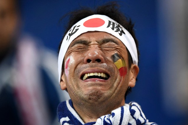 Torcedor chora após a eliminação do Japão nas oitavas de final com a derrota para a Bélgica na Arena Rostov - 02/07/2018