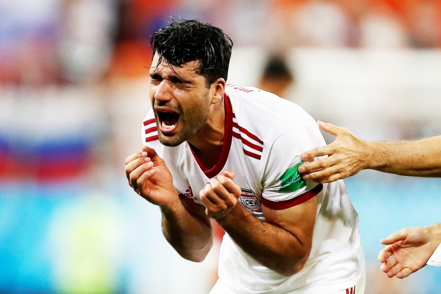 O jogador Mehdi Taremi, do Irã, comemora após partida contra Portugal, válida pela fase de grupos da Copa do Mundo, realizada em Saransk. Os iranianos empataram a partida em 1 a 1, nos acréscimos do segundo tempo - 25/06/2018