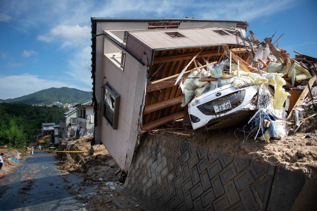Casa fica seriamente danificada em uma área atingida pelas inundações em Kumano, prefeitura de Hiroshima, no Japão - 09/07/2018