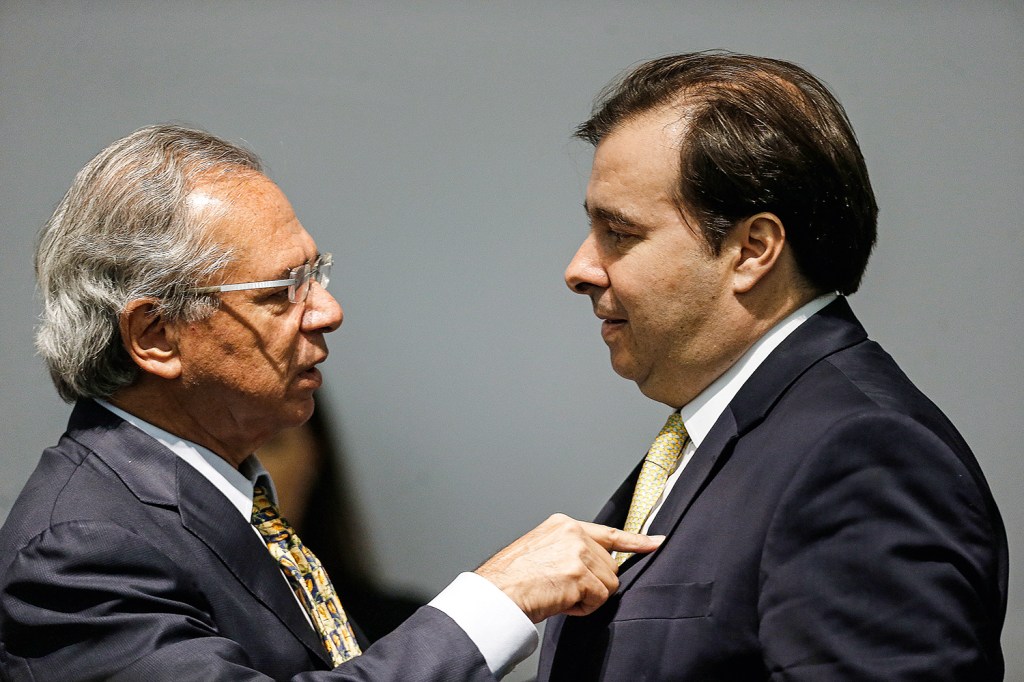 PAUTA COMUM - O ministro Paulo Guedes e o deputado Rodrigo Maia: afinados na defesa do ajuste das contas públicas, da reforma da Previdência e das privatizações