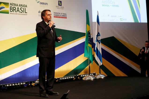 O presidente Jair Bolsonaro fala em um evento com empresários israelenses e brasileiros, com a presença do primeiro-ministro israelense Benjamin Netanyahu, em Jerusalém - 02/04/2019