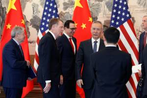 Chinese Vice Premier Liu He, U.S. Treasury Secretary Steven Mnuchin, U.S. Trade Representative Robert Lighthizer, and U.S. Ambassador to China Terry Branstad talk after concluding their meeting at the Diaoyutai State Guesthouse in Beijing