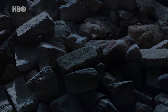 Os corpos de Jaime (Nikolaj Coster-Waldau) e Cersei (Lena Headey) soterrados