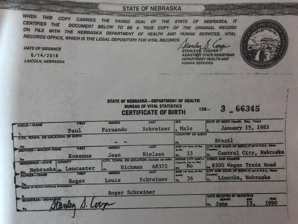 Documento de identidade americano de Paul Schreiner com o nome dos pais adotivos Roger e Rosanna