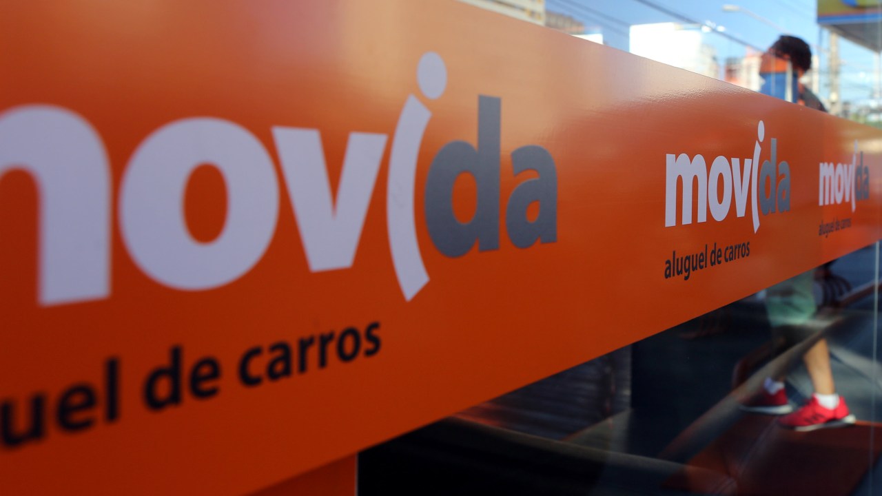 A consumer enters a Movida car rental service store in Sao Paulo, Brazil February 6, 2017. REUTERS/Paulo Whitaker