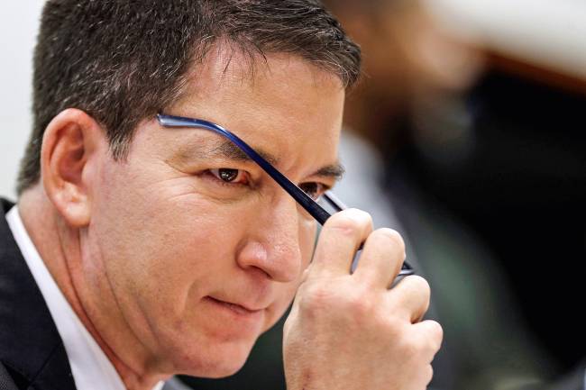 Author and journalist Glenn Greenwald attends a meeting of the human rights committee of the Chamber of Deputies in Brasilia Author and journalist Glenn Greenwald attends a meeting of the human rights committee of the Chamber of Deputies in Brasilia