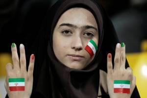 FILE PHOTO: An Iran fan gestures before their 2011 Asian Cup Group D soccer match against United Arab Emirates at Qatar Sports Club stadium in Doha