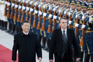 Chinese President Xi Jinping and Brazilian President Jair Bolsonaro attend a welcoming ceremony in Beijing