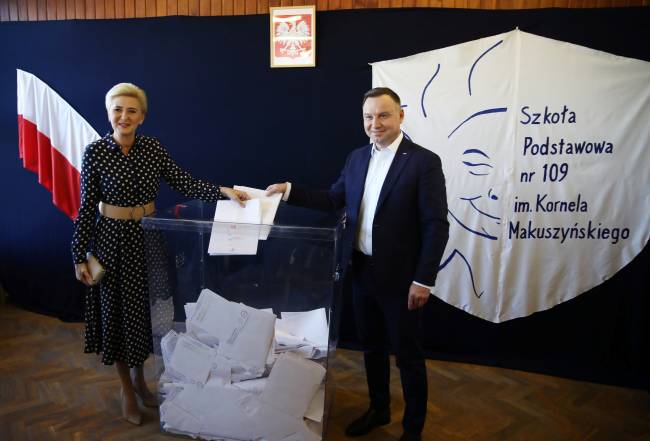 Poland’s President Andrzej Duda and his wife Agata Kornhauser-Duda cast their votes during parliamentary election at a polling station in Krakow Poland’s President Andrzej Duda and his wife Agata Kornhauser-Duda cast their votes during parliamentary election at a polling station in Krakow