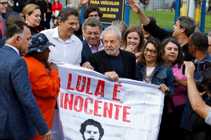 Former Brazilian President Luiz Inacio Lula da Silva walks out after being released from prison, in Curitiba