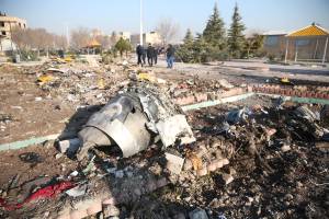 Debris of a plane belonging to Ukraine International Airlines, that crashed after taking off from Iran’s Imam Khomeini airport, is seen on the outskirts of Tehran