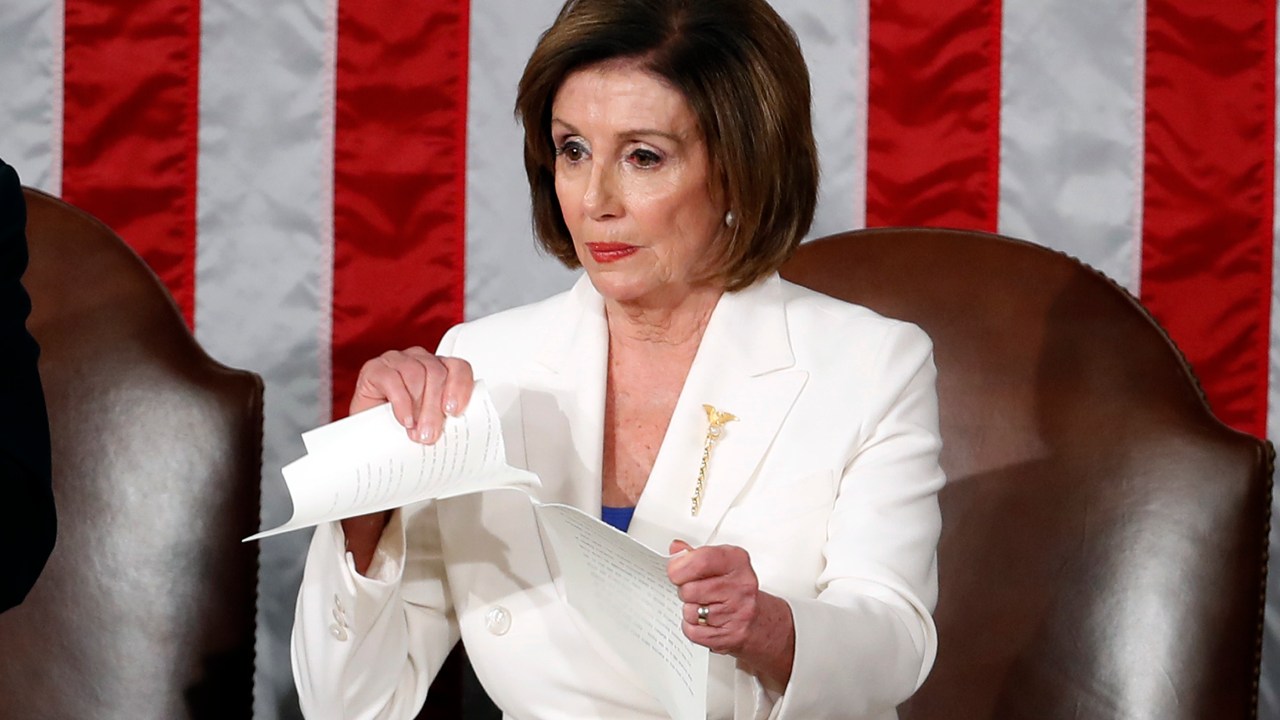 House Speaker Nancy Pelosi of Calif., tears her copy of President Donald Trump's State of the Union address after he delivered it to a joint session of Congress on Capitol Hill in Washington, Tuesday, Feb. 4, 2020. (AP Photo/Alex Brandon)