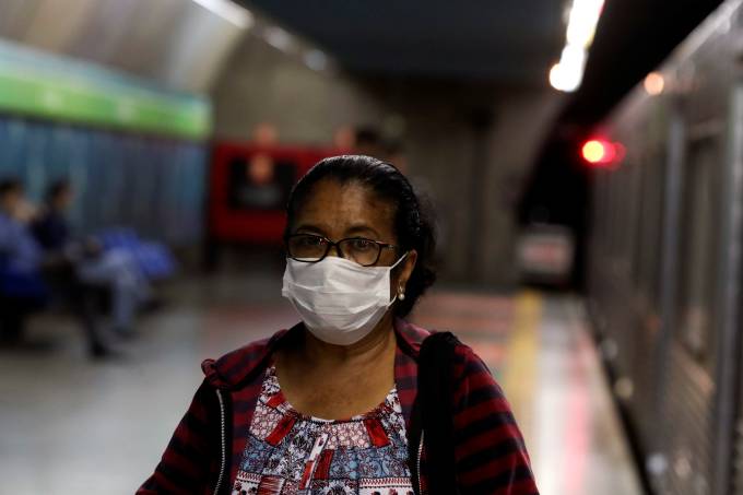 A passenger wears a protective facemask at a subway station after the first case of coronavirus was confirmed in Sao Paulo