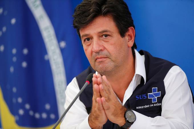 Brazil’s Minister of Health Luiz Henrique Mandetta gestures during a news conference in Brasilia