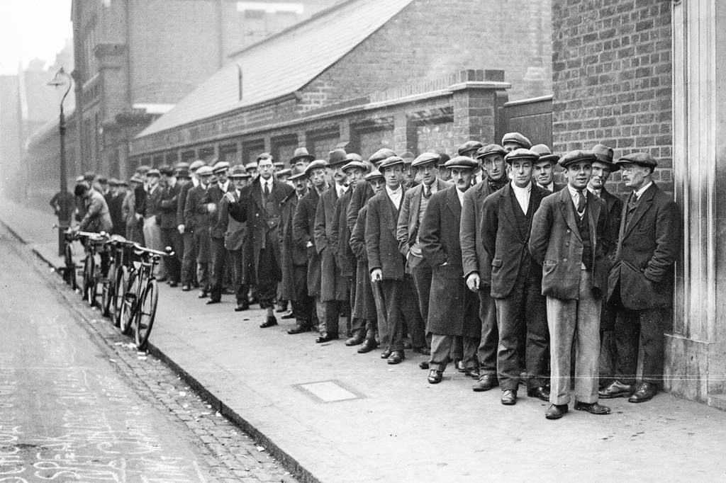 1929 - Na fila do emprego: nos EUA, a Grande Depressão levou a inovações como o salário mínimo -