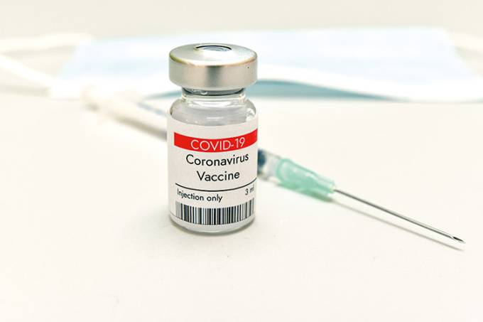 Coronavirus COVID-19 vaccine in vial and syringe.
