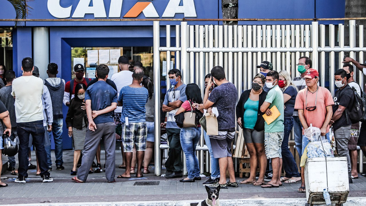 Crowds Line Up at Caixa Economica Federal to Receive Urgent Government Benefit Amidst the Coronavirus (COVID - 19) Pandemic