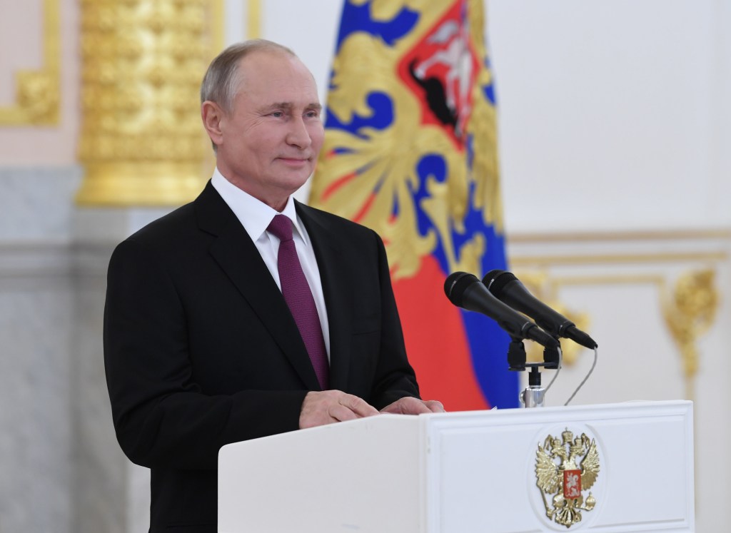 Russian President Vladimir Putin delivers a speech during a ceremony to receive credentials from foreign ambassadors at the Moscow Kremlin's Alexander Hall, in Moscow, on November 24, 2020. (Photo by Alexey NIKOLSKY / Sputnik / AFP)