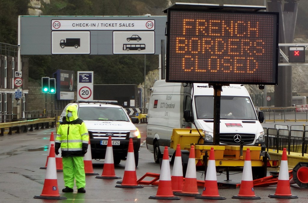 A sign alerts customers that the "French Borders are Closed" at the entrance to the Port of Dover in Kent, south east England on December 21, 2020, as a string of countries banned travellers all but unaccompanied freight arriving from the UK, due to the rapid spread of a more-infectious new coronavirus strain. - Britain's critical south coast port at Dover said on Sunday it was closing to all accompanied freight and passengers due to the French border restrictions "until further notice". (Photo by William EDWARDS / AFP)