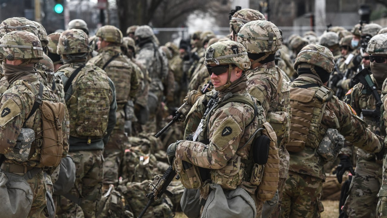 WASHINGTON, DC - JANUARY 19: National Guard patrol the National Mall on January 19, 2021 in Washington, DC. Tight security measures are in place for Inauguration Day due to greater security threats after the attack on the U.S. Capitol on January 6. Stephanie Keith/Getty Images/AFP