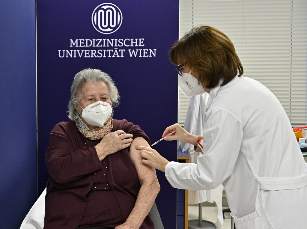VIENNA, AUSTRIA - DECEMBER 27: A woman gets vaccinated against Coronavirus (Covid-19) pandemic in Vienna, Austria on December 27, 2020. (Photo by APA / Pool/Anadolu Agency via Getty Images)