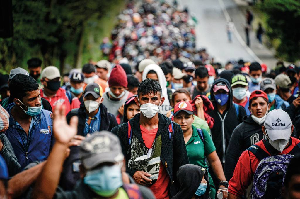 GUATEMALA-HONDURAS-US-MIGRATION-CARAVAN EM MARCHA - Caravana de hondurenhos a caminho da fronteira: esperança de que o governo Biden seja mais brando -