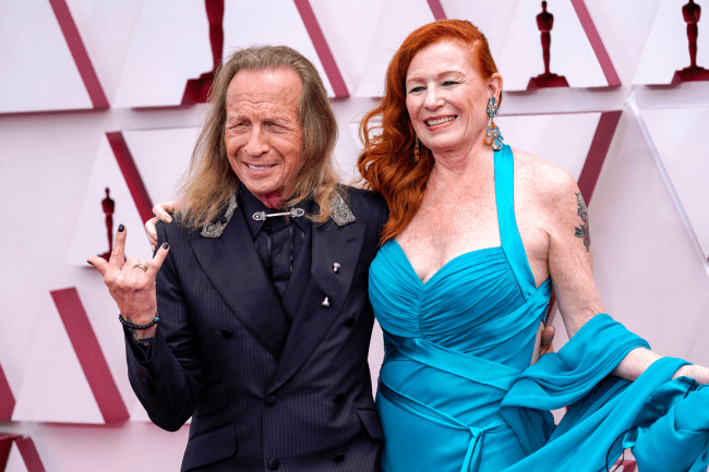 Paul Raci e Liz Hanley Raci foram praticamente os estreantes do tapete vermelho do Oscar 2021. Rici está indicado na categoria de Melhor Ator Coadjuvante por seu papel em ‘Som do Silêncio’ Paul Raci e Liz Hanley Raci foram praticamente os estreantes do tapete vermelho do Oscar 2021. Rici está indicado na categoria de Melhor Ator Coadjuvante por seu papel em 'Som do Silêncio'