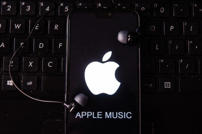 In this photo illustration the Apple Music logo seen