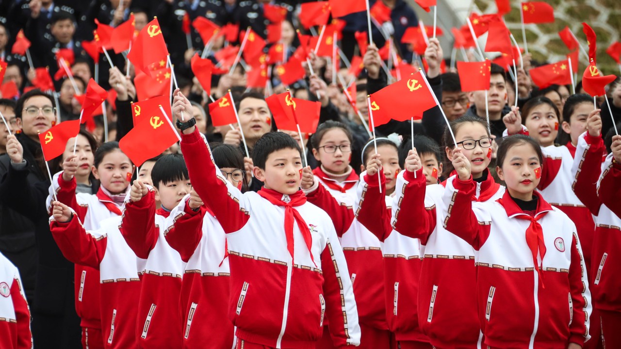 HUAI'AN, CHINA - FEBRUARY 28, 2021 - Citizens and tourists sing patriotic songs to celebrate the 100th anniversary of the founding of the Communist Party of China, Huai'an City, Jiangsu Province, China, February 28, 2021.- PHOTOGRAPH BY Costfoto / Barcroft Studios / Future Publishing (Photo credit should read Costfoto/Barcroft Media via Getty Images)