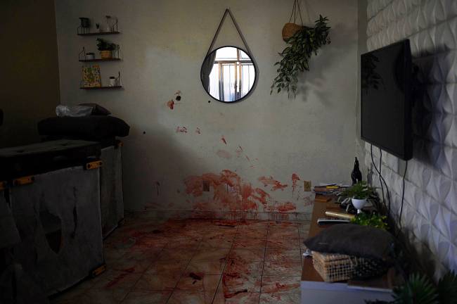 BRAZIL-CRIME-DRUGS-POLICE Marcas de sangue das vítimas mortas na ação policial