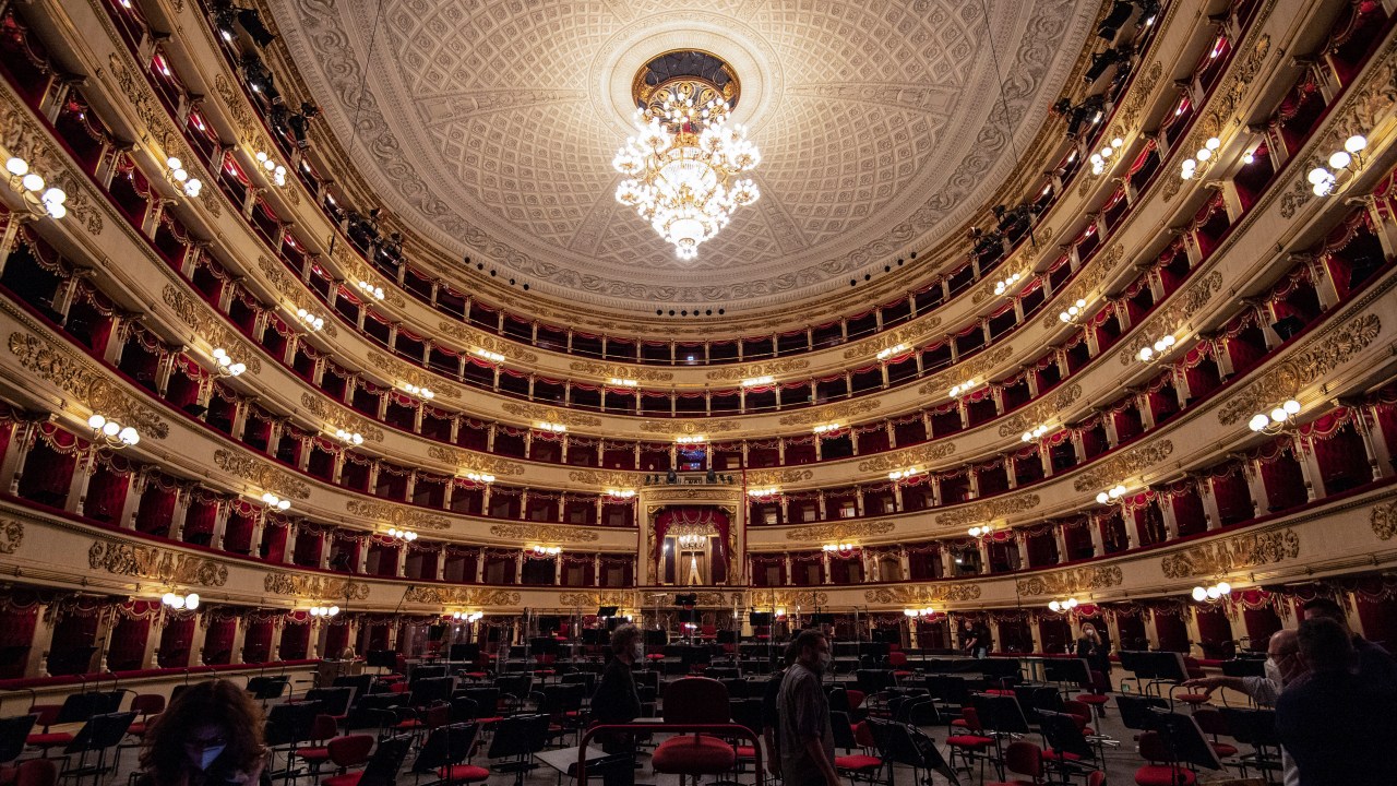 A general view shows the Scala Opera House on may 07, 2021 prior a rehearsal in Milan. - La Scala will reopen on May 10, 2021 to a limited audience of 500 people who will be able to attend three concerts in May. (Photo by MIGUEL MEDINA / AFP)