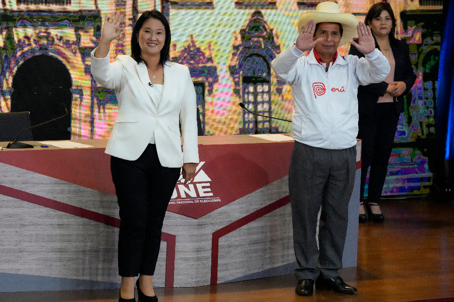 Peruvian presidential candidates, right-wing Keiko Fujimori (L) and socialist Pedro Castillo