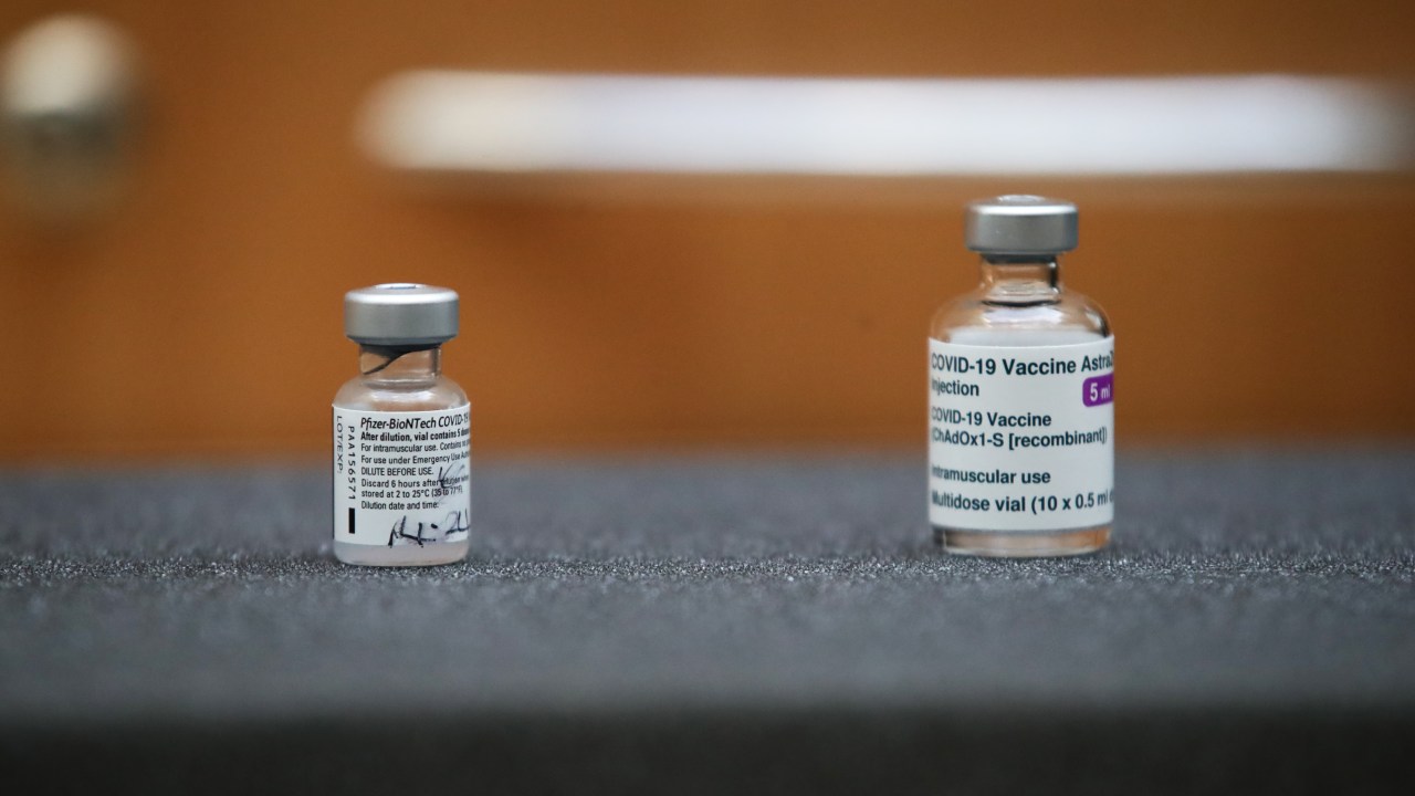 LONDON, ENGLAND - MARCH 09: The first ever vials of the Pfizer-BioNTech and Oxford/Astra Zeneca Covid-19 vaccinations are on display at Skipton House on March 9, 2021 in London, England. (Photo by Aaron Chown-WPA Pool/Getty Images)