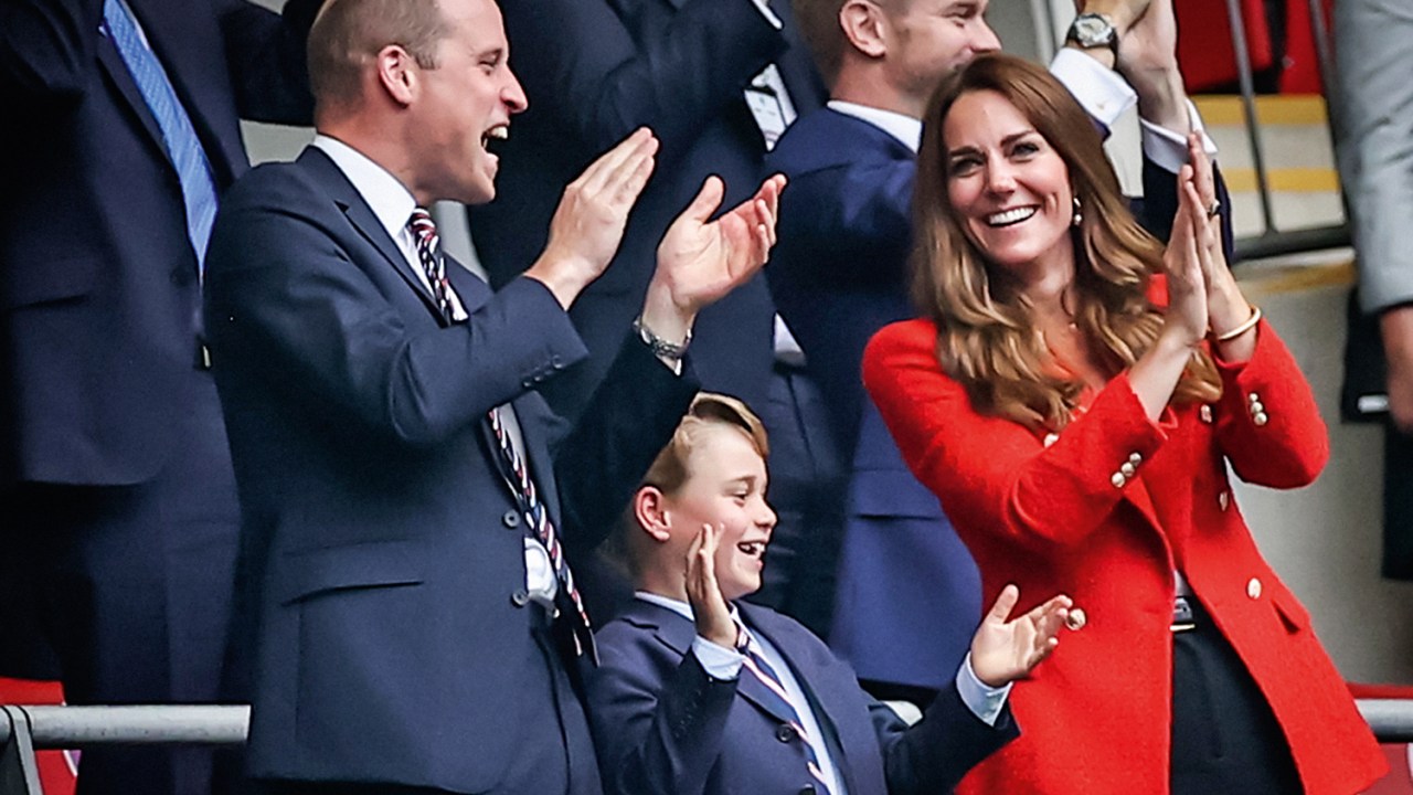 Príncipe William, a Duquesa de Cambridge, Kate, e o filho George -