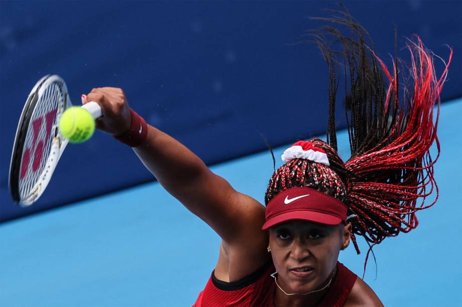 A japonesa Naomi Osaka em partida de tênis contra Viktorija Golubic, da Suíça -