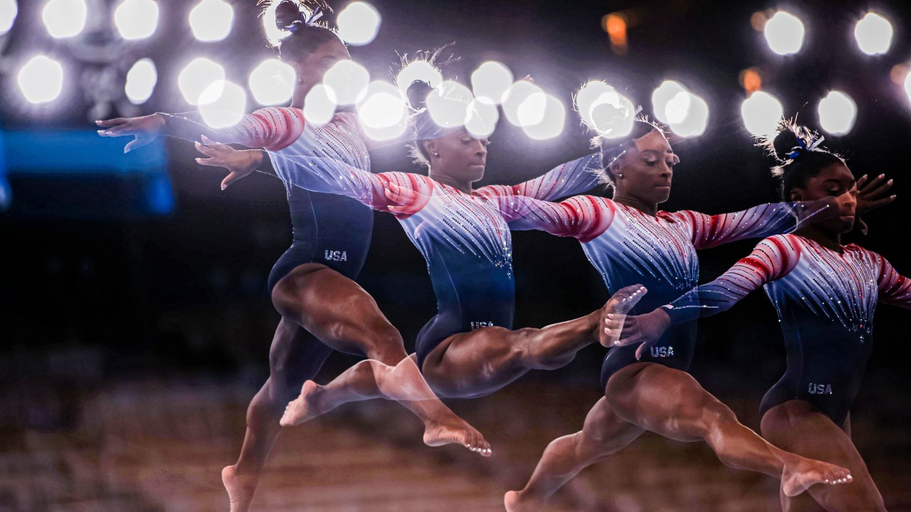 TOKYO, JAPAN - AUGUST 03: (EDITORS NOTE: Multiple exposures were combined in camera to produce this image.) Simone Biles of Team United States warms up prior to the Women's Balance Beam Final on day eleven of the Tokyo 2020 Olympic Games at Ariake Gymnastics Centre on August 03, 2021 in Tokyo, Japan. (Photo by Amin Mohammad Jamali/Getty Images)