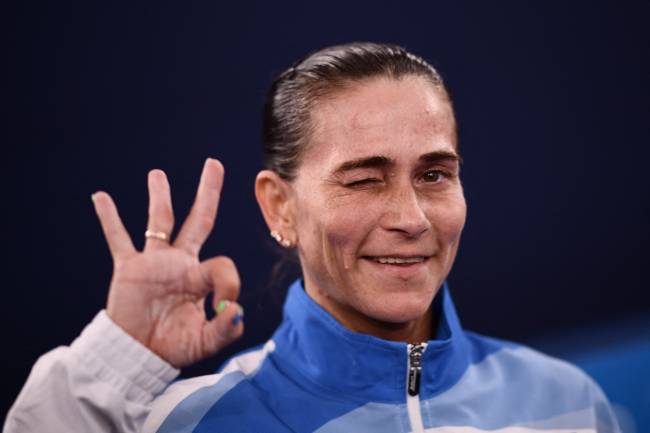 Uzbekistan's Oksana Chusovitina poses after competing in the artistic gymnastics vault event of the women's qualification during the Tokyo 2020 Olympic Games at the Ariake Gymnastics Centre in Tokyo on July 25, 2021. (Photo by Loic VENANCE / AFP)