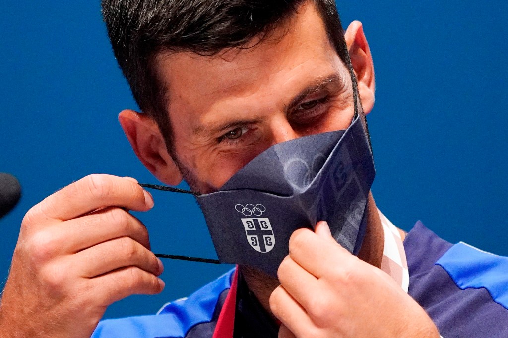 Tokyo (Japan), 22/07/2021.- Novak Djokovic of Serbia wears a face mask during a press conference at the main press center in Tokyo, Japan, 22 July 2021. The Tokyo 2020 Olympic Games start on 23 July. (Tenis, Japón, Tokio) EFE/EPA/FRANCK ROBICHON