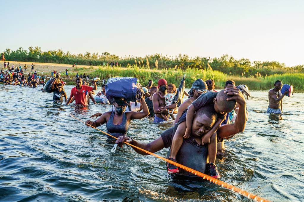 CHOQUE - Imigrantes haitianos na fronteira: problema que se agrava a cada dia -