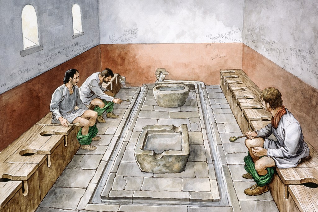 SEM PRIVACIDADE - Simulação de sanitário público na Roma antiga: os locais eram financiados pela elite -