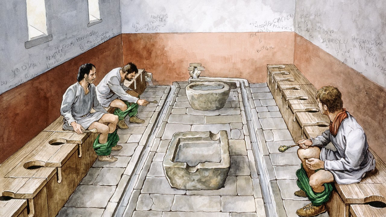 SEM PRIVACIDADE - Simulação de sanitário público na Roma antiga: os locais eram financiados pela elite -