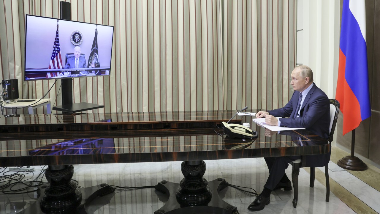 SOCHI, RUSSIA - DECEMBER 7, 2021: Russia's President Vladimir Putin (R) is seen in his office in the Bocharov Ruchei residence in Sochi during a bilateral meeting with US President Biden via a video call. Mikhail Metzel/POOL/TASS (Photo by Mikhail MetzelTASS via Getty Images)