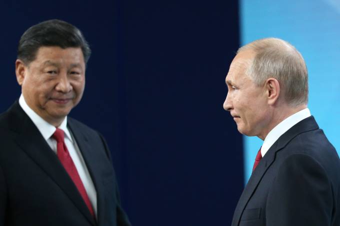 O presidente da China, Xi Jinping, e da Rússia, Vladimir Putin, durante reunião de Cúpula realizada em 2019