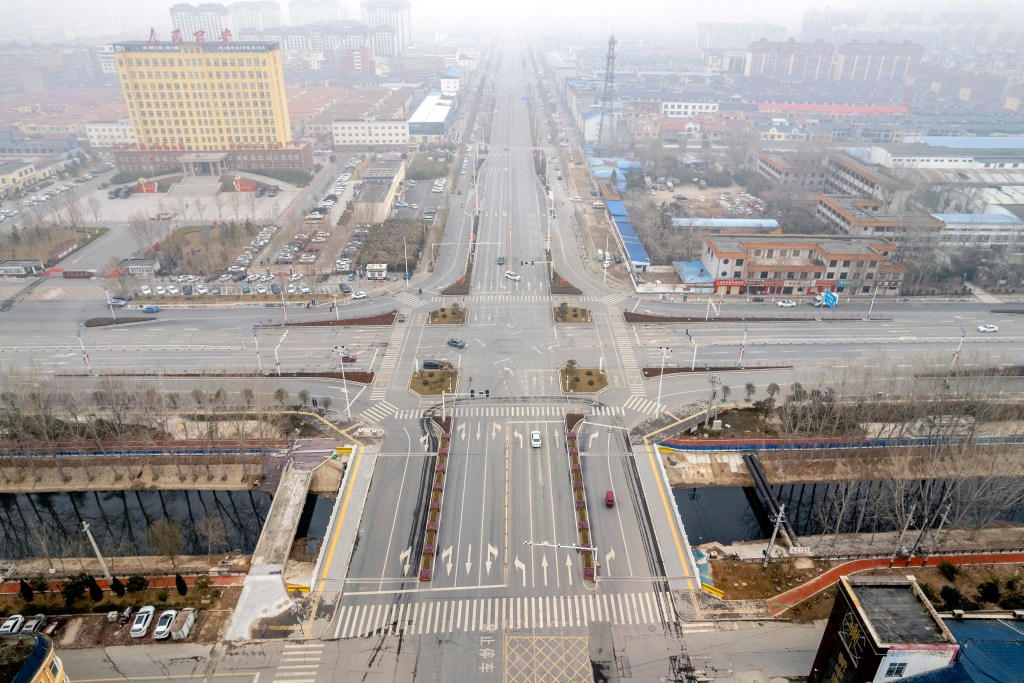 ANYANG, CHINA - JANUARY 11, 2022 - An aerial photo taken on Jan. 11, 2022 shows empty roads in Hua County, Anyang City, Henan Province, China. A total of 58 locally confirmed COVID-19 cases were reported in Anyang, Henan province, from 0 PM On Jan 10 to 8 PM on Jan 11. (Photo credit should read Costfoto/Future Publishing via Getty Images)