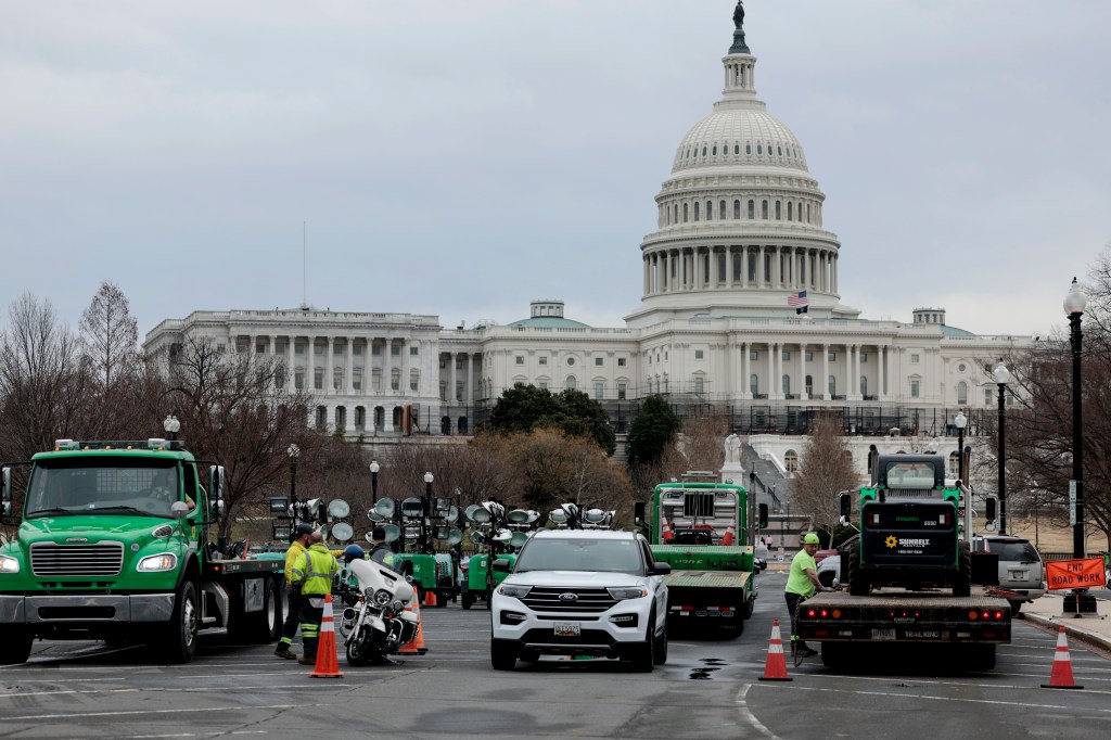 WASHINGTON, DC - FEBRUARY 23: Light towers are assembled in a closed off a section of Pennsylvania Ave. near the U.S. Capitol Building on February 23, 2022 in Washington, DC. The U.S. Defense Department approved the request by U.S. Capital Police to deploy National Guard members and large tactical vehicles ahead of possible trucker convoy protests descending on the Washington area and U.S. President Joe Biden's State of the Union address. (Photo by Anna Moneymaker/Getty Images)