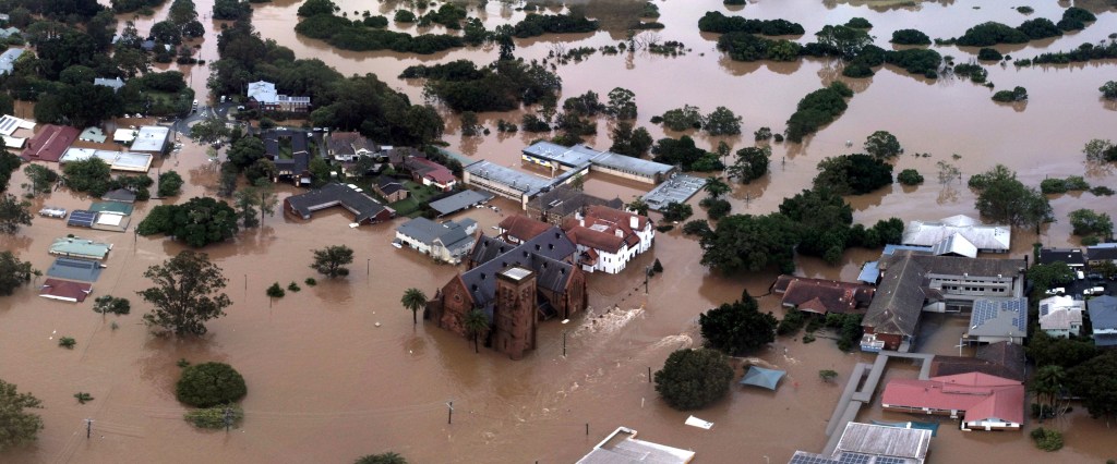 LISMORE, AUSTRALIA - FEBRUARY 28: (EDITORS NOTE: Image is a digital [panoramic] composite.) A general view of Lismore captured from the flood line at New Ballina Road at 18:30 on February 28, 2022 in Lismore, Australia. Over 15,000 are predicted to be flood-damaged after the Brisbane River peaked at 3.85 metres. (Photo by Andrew Sibley/Getty Images)