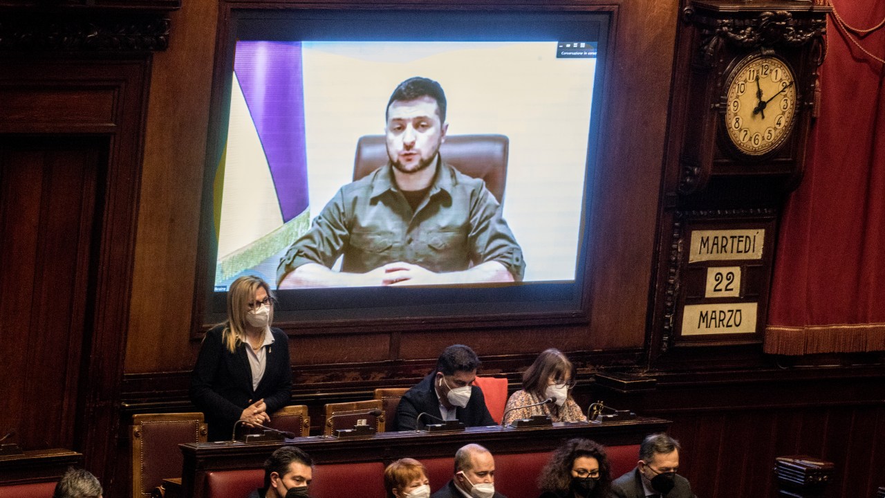 ROME, ITALY - MARCH 22: Ukrainian President Volodymyr Zelensky addresses the Italian Parliament via live video from the embattled city of Kyiv on March 22, 2022 in Rome, Italy. The Ukrainian president has been on a virtual world tour in recent weeks, addressing foreign lawmakers to seek their countries' support in defending Ukraine against Russia's invasion. (Photo by Alessandra Benedetti - Corbis/Corbis via Getty Images)
