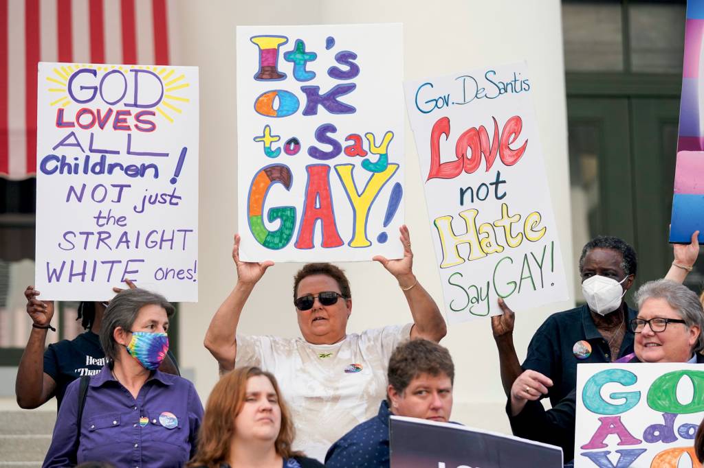 Demonstrators gather to speak on the steps of the Florida Historic Capitol Museum in front of the Florida State Capitol, Monday, March 7, 2022, in Tallahassee, Fla. Florida House Republicans advanced a bill, dubbed by opponents as the 