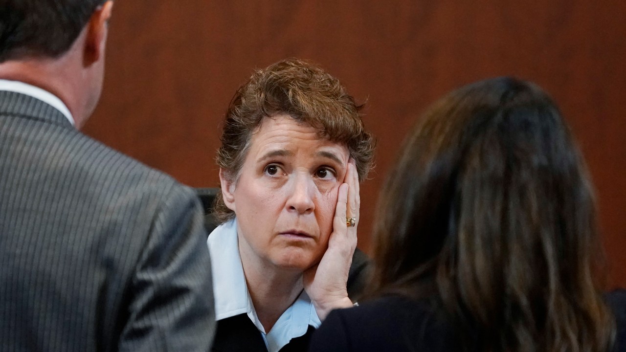 Judge Penney Azcarate talks to attorneys during bench conference in the courtroom after a break at the Fairfax County Circuit Courthouse in Fairfax, Virginia, on May 16, 2022. - Actor Johnny Depp sued his ex-wife Amber Heard for libel in Fairfax County Circuit Court after she wrote an op-ed piece in The Washington Post in 2018 referring to herself as a "public figure representing domestic abuse." (Photo by Steve Helber / POOL / AFP)